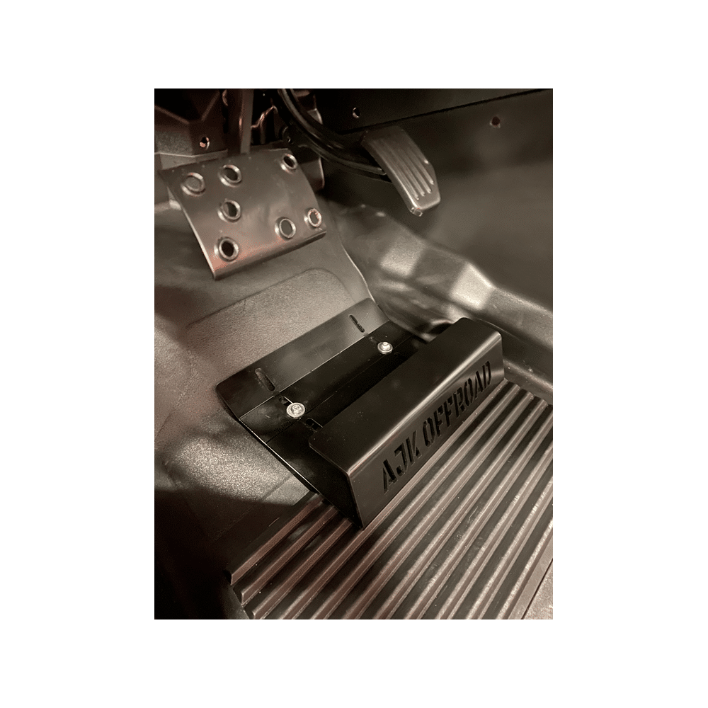 Close-up of a Honda Talon Foot Rest by AJK Offroad featuring a CNC laser cut metal reinforcement plate and non-slip pedal. The ribbed texture includes ATV OFFROAD branding for durability and grip.