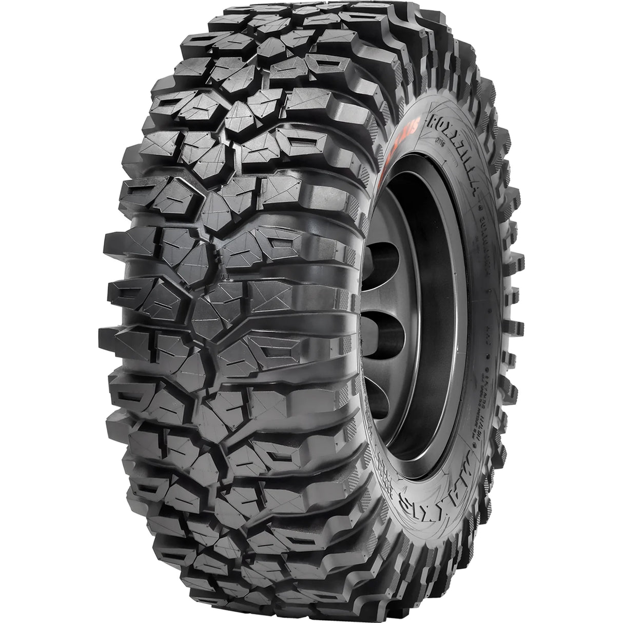 The My Store Maxxis Roxxilla is a rugged all-terrain tire with deep, aggressive treads for off-road driving. Its sidewall boasts bold patterns, and the tire is angled to highlight its depth and texture against a white background.